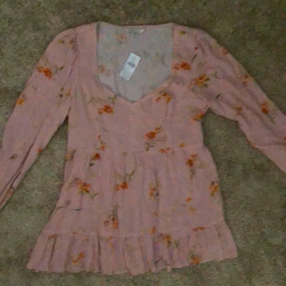 Babydoll blouse. New. Too big for me.Tag still on